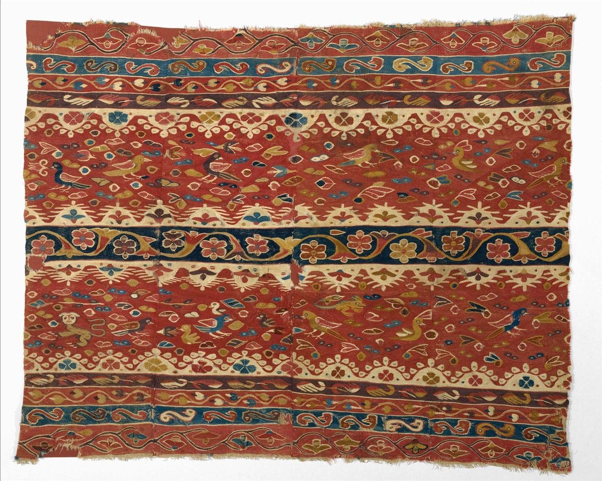Colonial Peruvian woman's mantle with bands of birds and European-style floral scrolls