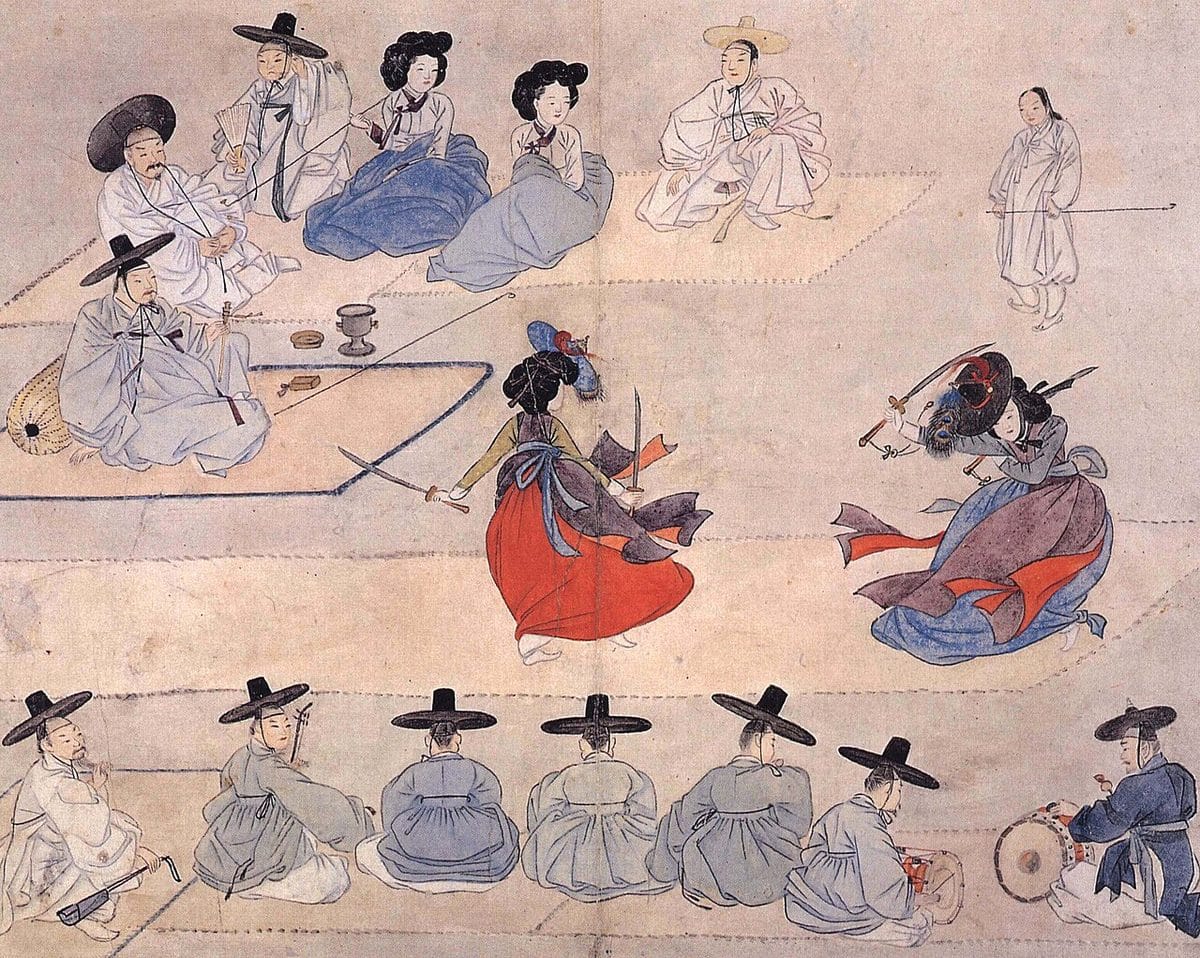 Painting of two women dancing with swords in short jeogori jackets and full red and blue chima skirts, watched by seated men in wide-brimmed black gat hats