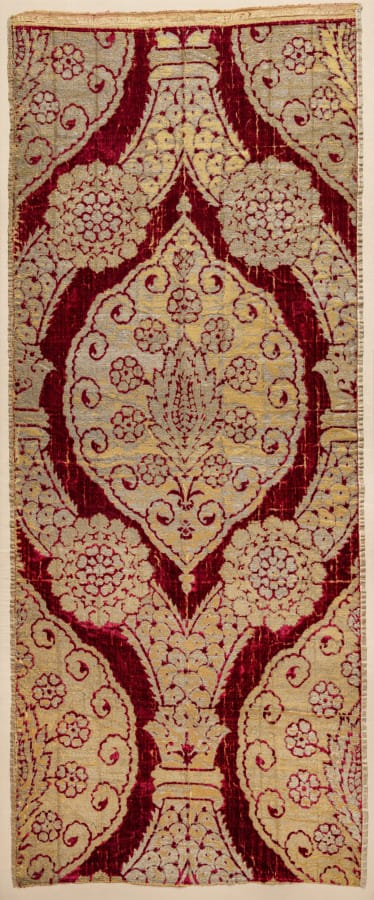 Long panel of brocaded silk velvet with large ogival lattice and medallions in red, gold, and silver
